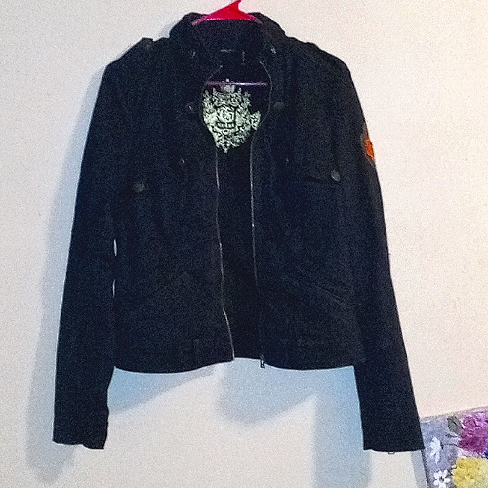 A Women's Black (size Large) Fall jacket by Guess.